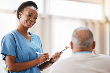Nurse smiling at patient