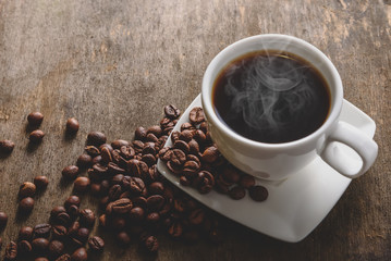 cup of coffee and coffee beans