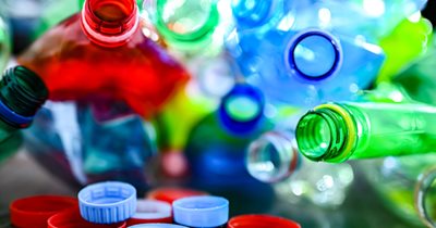 blue, red, green plastic bottles