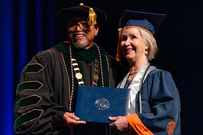 72 year old graduates from nursing school. 