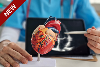 Nurse with figure of a heart with diagnostic imaging