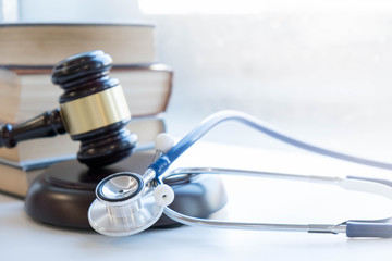 scales of justice and gavel on a desk