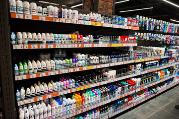 grocery store aisle with rows of beauty products