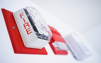 fire alarm on hospital wall
