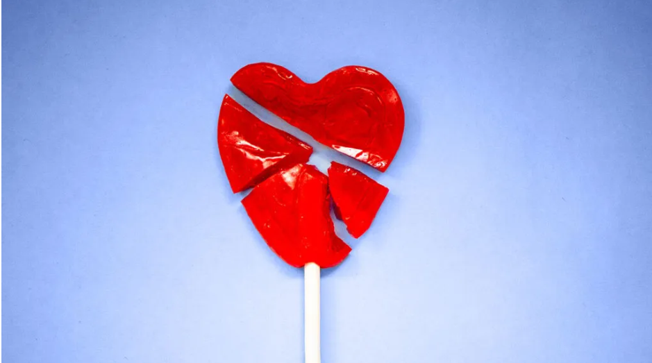 heart shaped lollipop cracked into peices